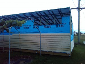 West side - cladding - the holes are where the clerestory lights will be
